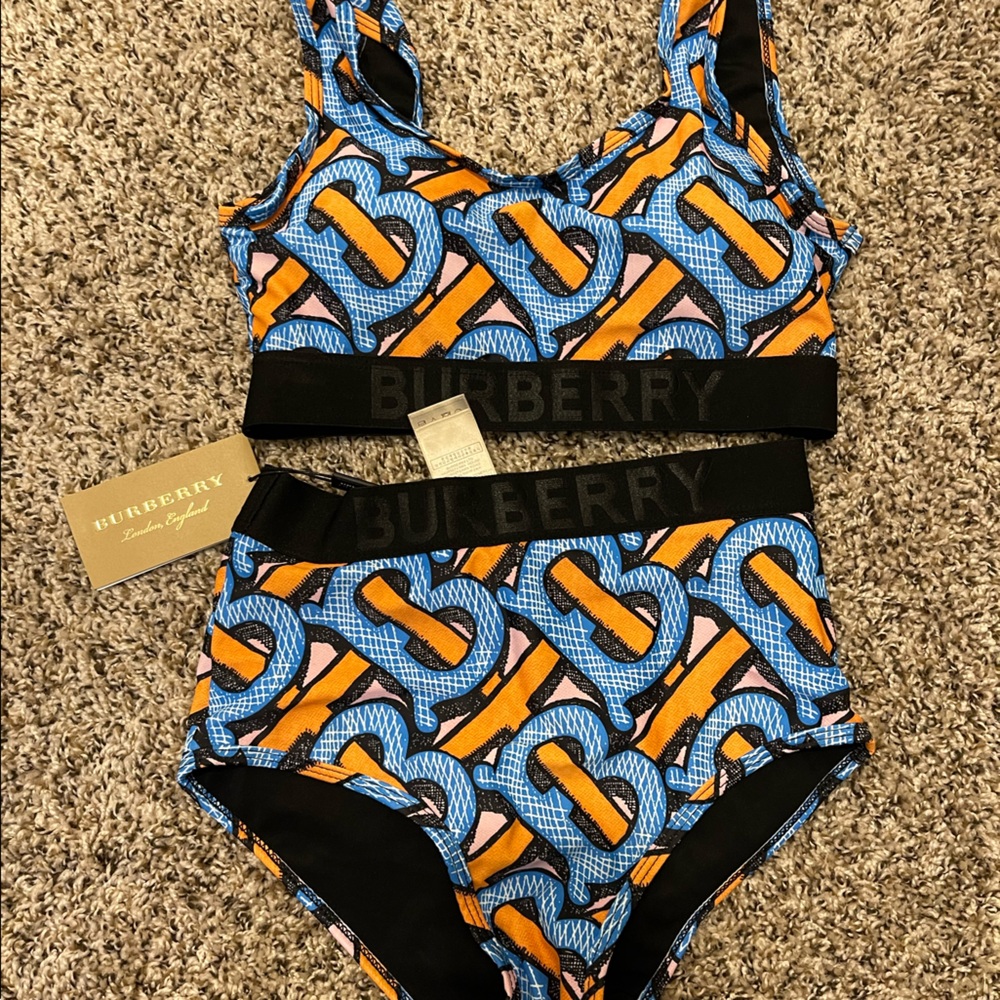 Burberry swim suit. NEVER WORN